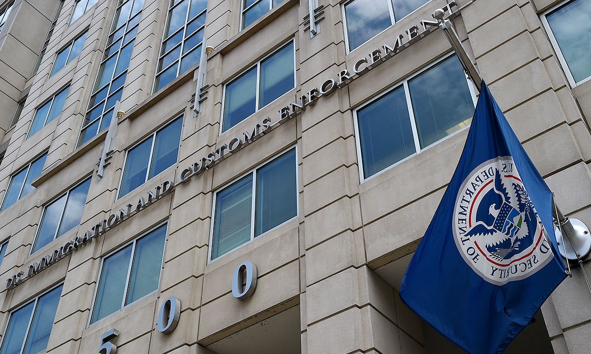 The Department of Homeland Security flag flies outside the Immigration and Customs Enforcement (ICE) headquarters