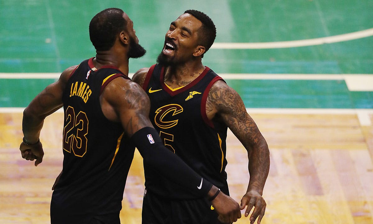 LeBron James #23 of the Cleveland Cavaliers celebrates with JR Smith #5 in the second half against the Boston Celtics during Game Seven of the 2018 NBA Eastern Conference Finals at TD Garden on May 27, 2018 in Boston