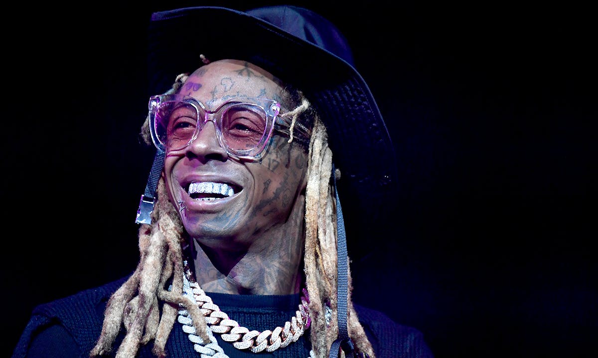 Lil Wayne glasses hat smiling