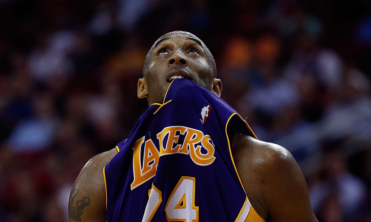 Kobe Bryant #24 of the Los Angeles Lakers looks up to the scoreboard