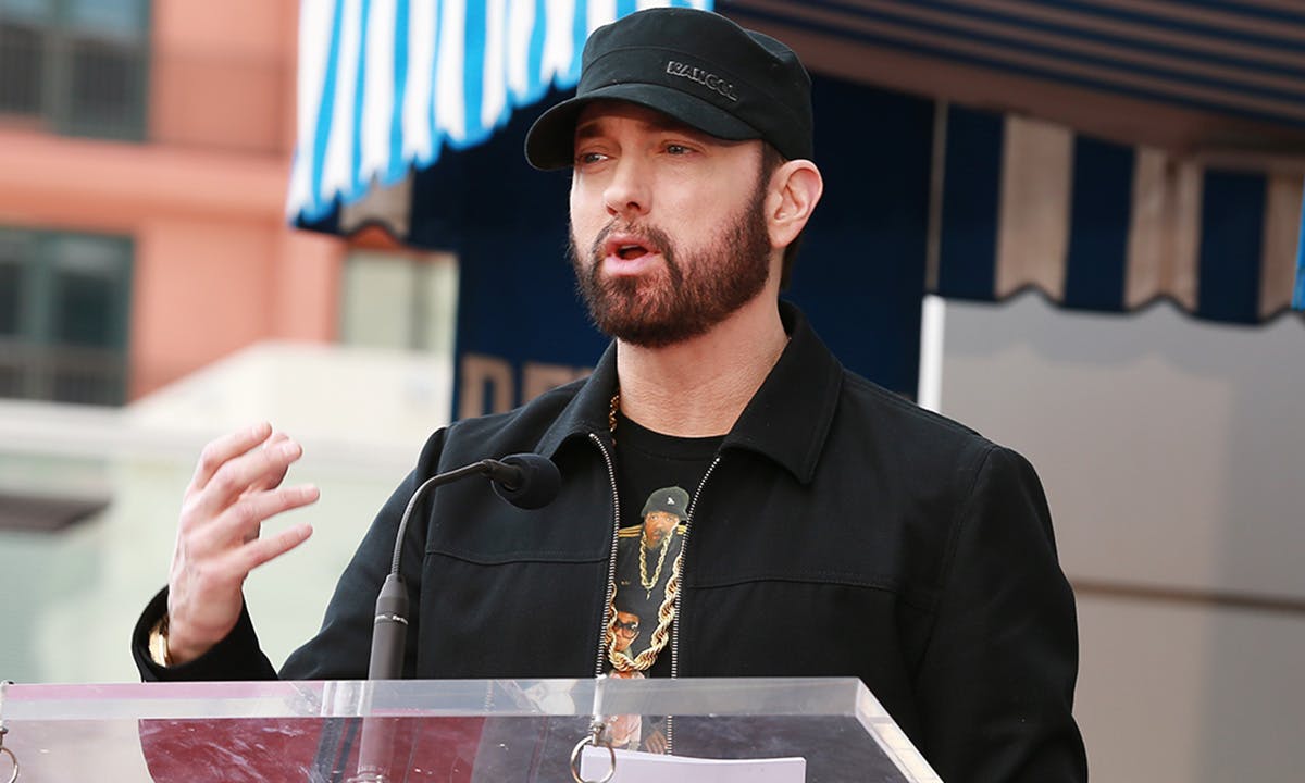 Eminem speaks during a ceremony