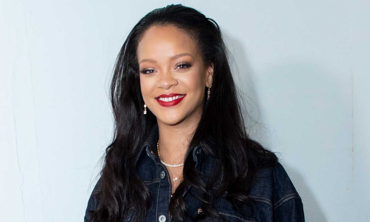 Rihanna smiling on the red carpet