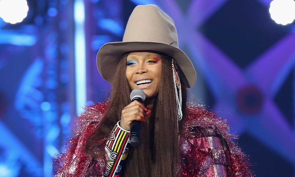 Erykah Badu performing on stage