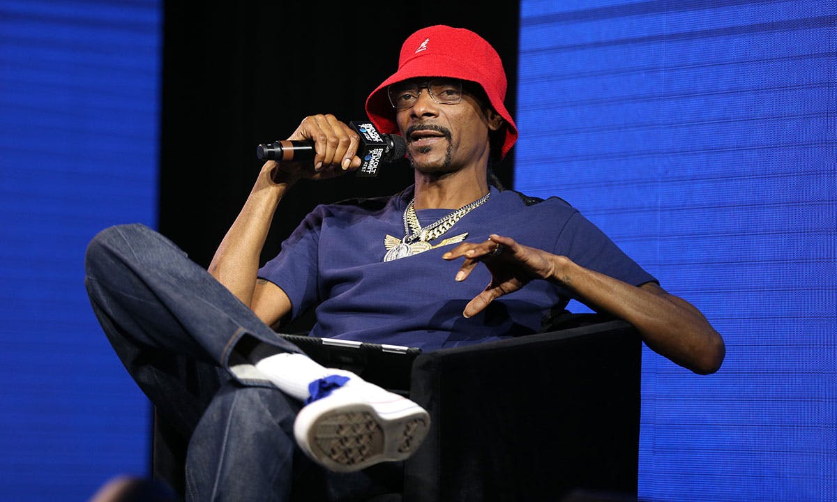 Snoop Dogg speaks onstage at the REVOLT X AT&T summit