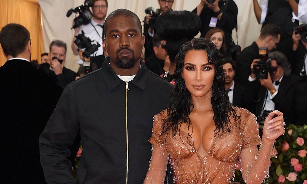 kanye west kim kardashian surrogate labor