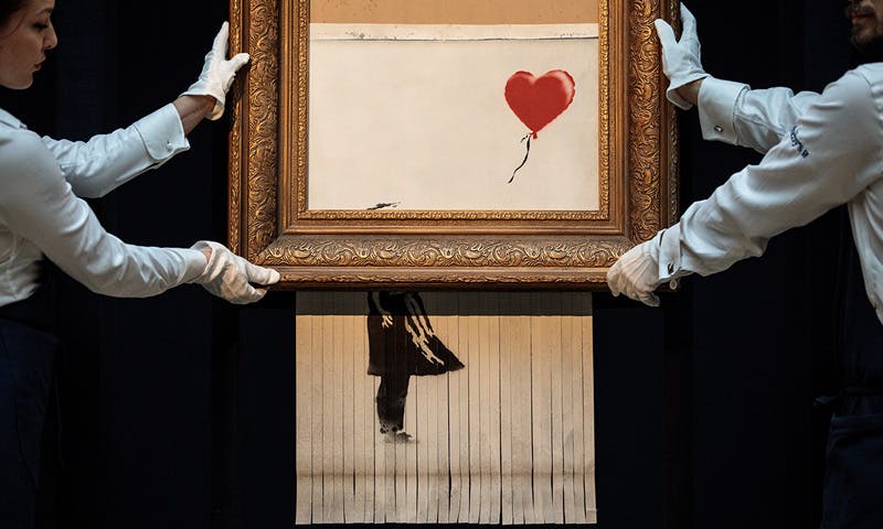 banksy shredded painting exhibition christies david hockney love is in the bin