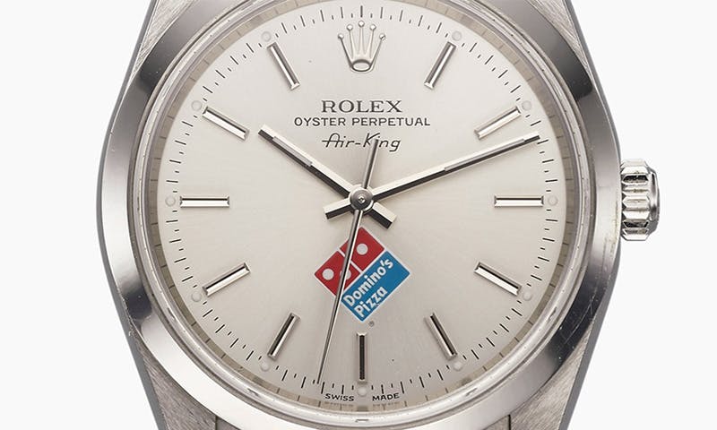 This Is the Inside Story Behind the Bizarre Domino s Rolex