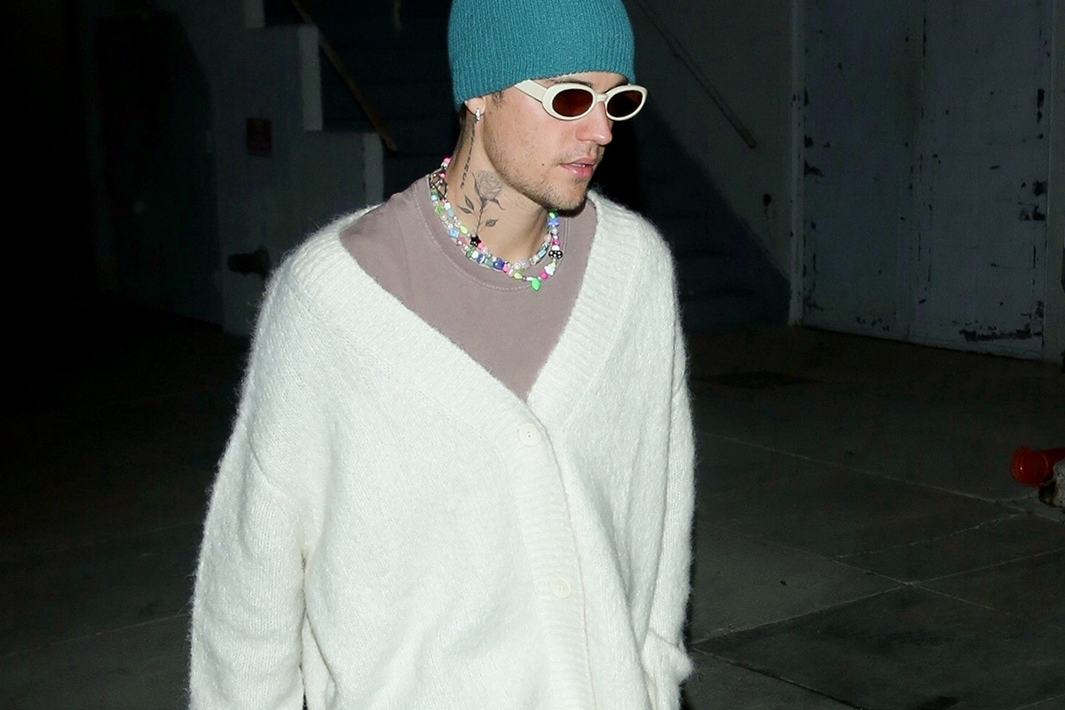 Justin Bieber wears a denim Louis Vuitton jacket as he makes a