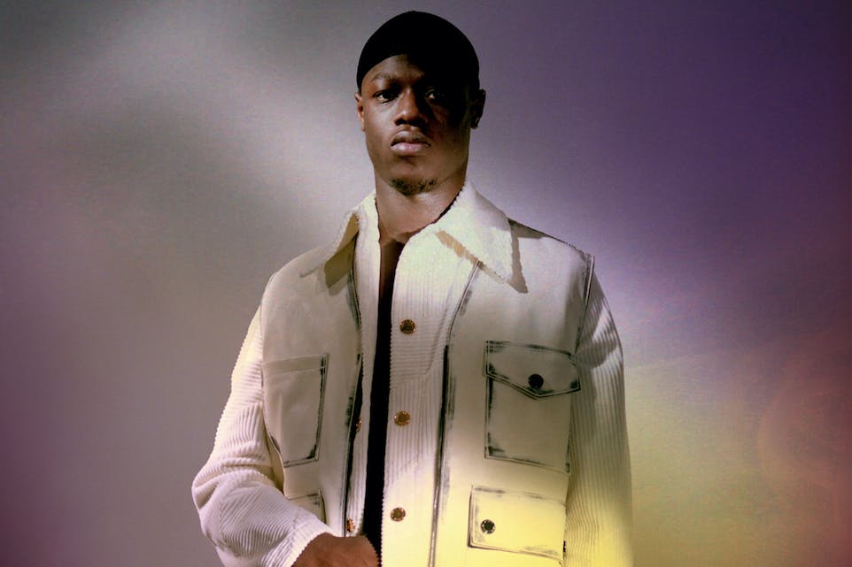 J Hus white jacket