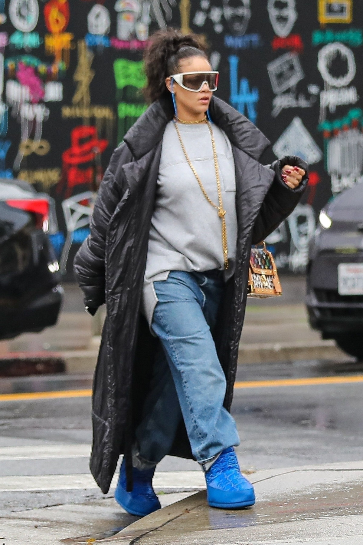 Rihanna Styles Out in Vault Moon Boots Vuitton