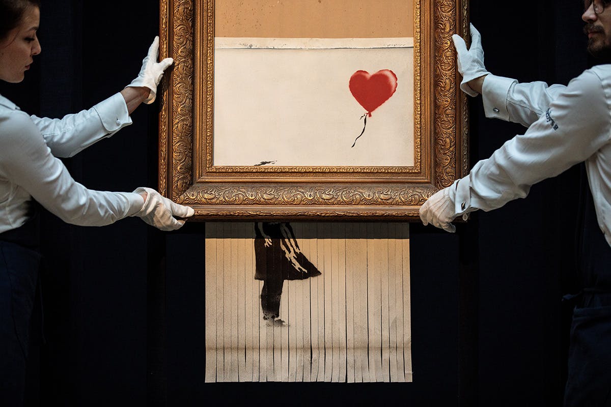 banksy shredded painting exhibition christies david hockney love is in the bin