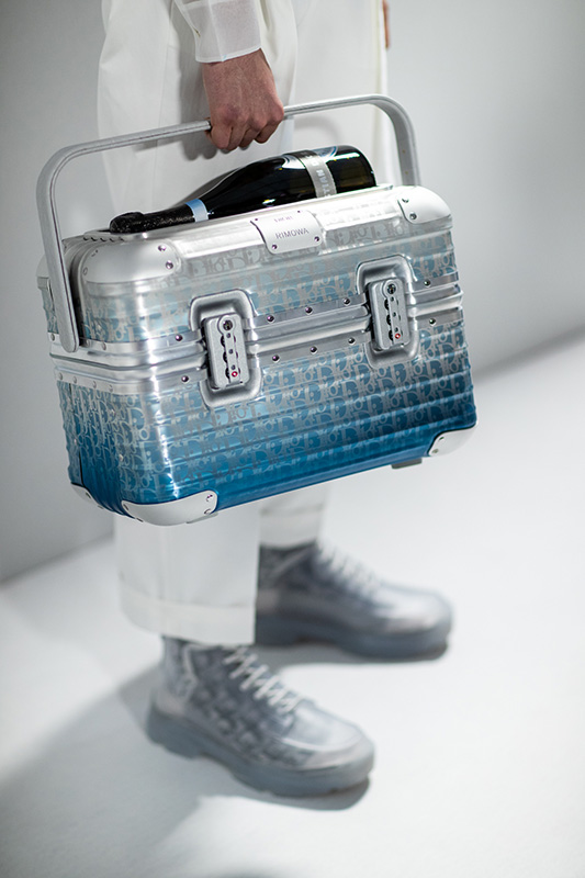 Kim Jones' latest Dior collection included a monogrammed collaboration with  Rimowa - Buro 24/7