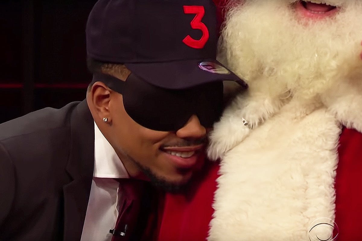 Chance the Rapper nuzzles Santa