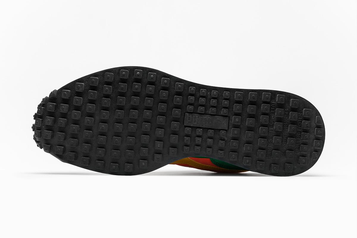 orange and green style rider puma shoe