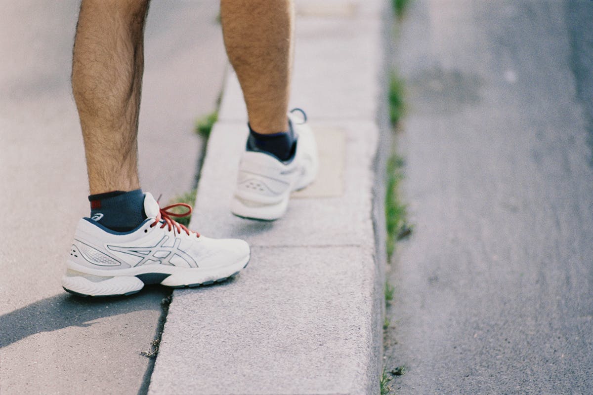 reigning champ x asics gel nimbus 22 editorial shot