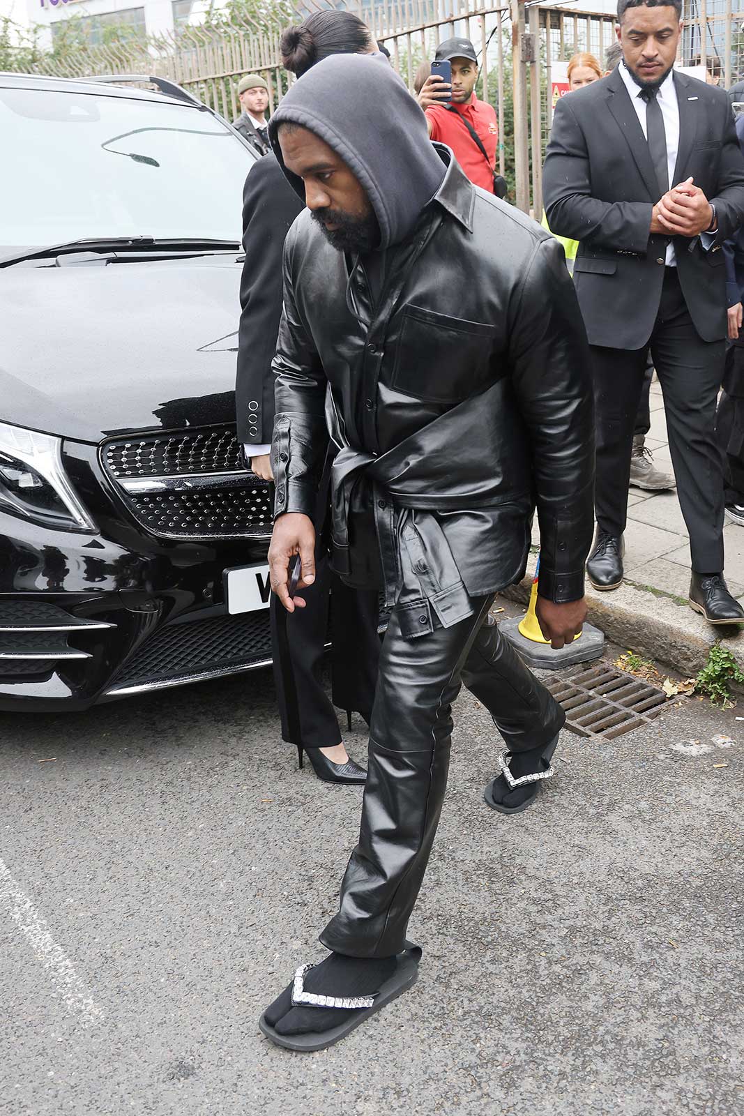 Kanye West is apparently team socks and sandals