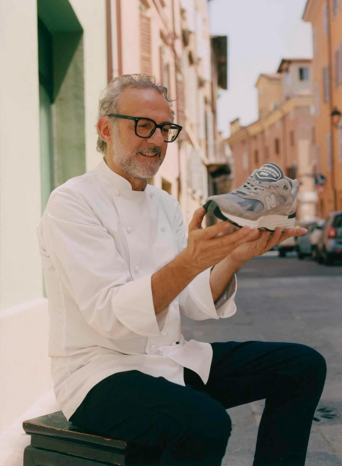 Lifestyle photos showing Italians wearing New Balance's grey suede 991v2 sneaker