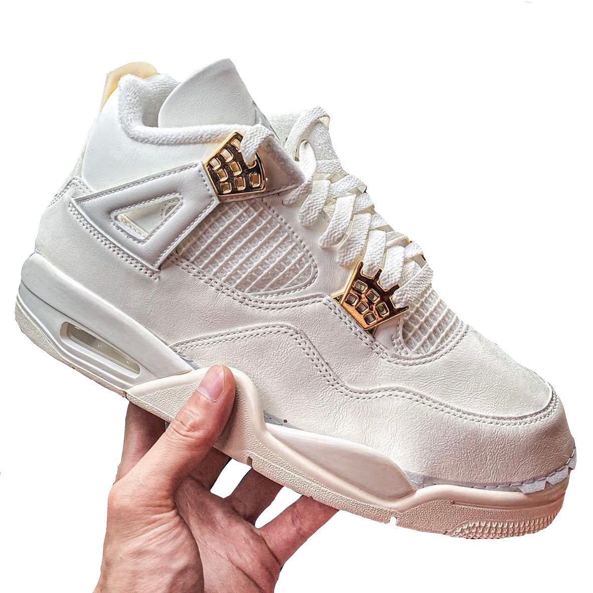 A New (Gilded) Air Jordan 4 "Sail" Releases Spring 2024