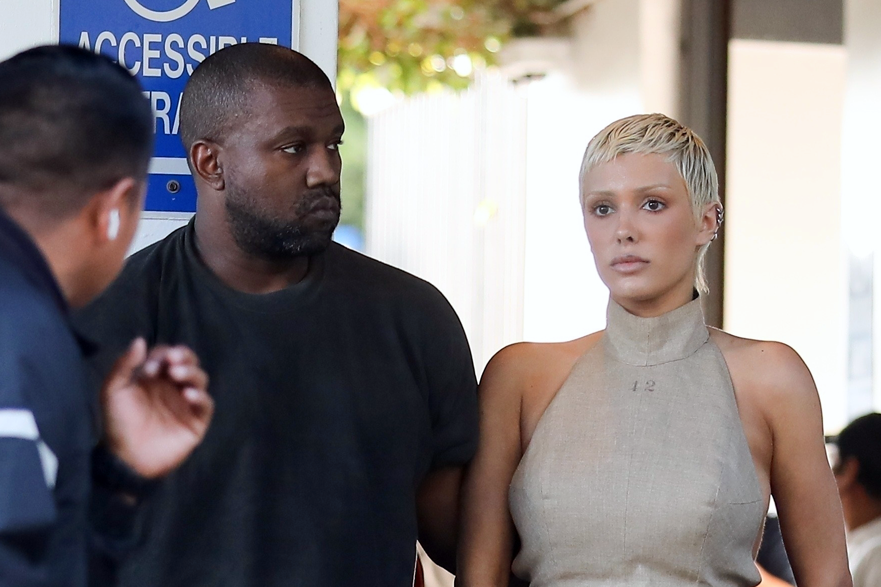Kanye West & wife Bianca Censori seen wearing a black T-shirt & beige top