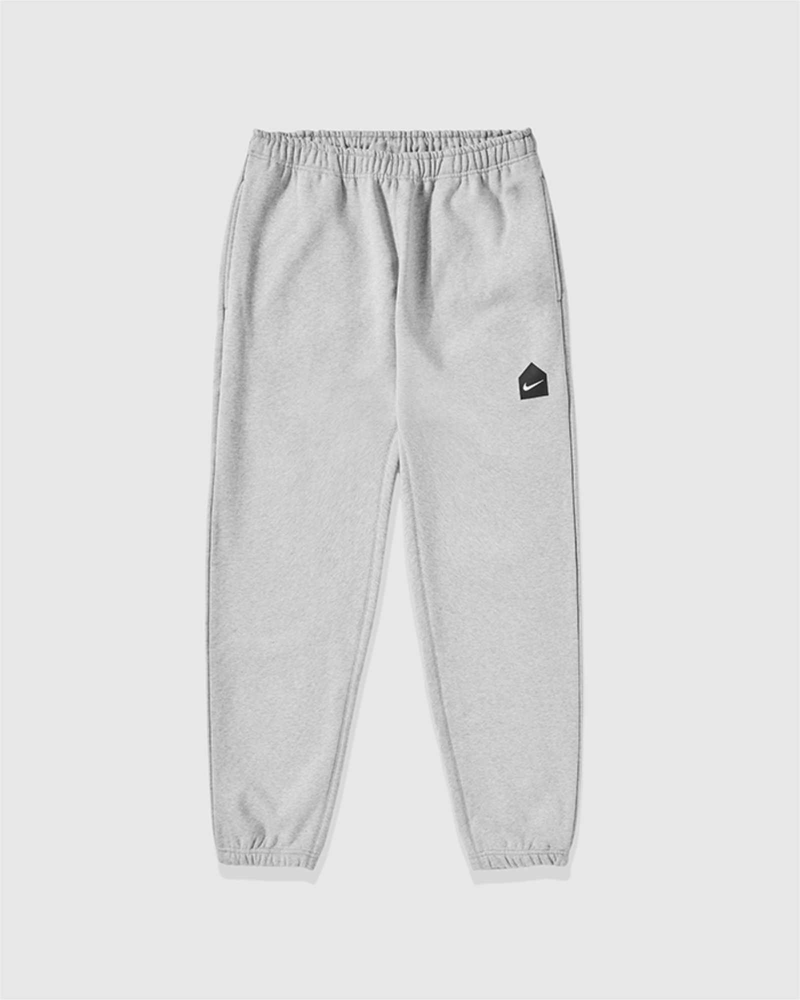 Nike & Dover Street Market's fleece sweats collab in grey, black, and navy