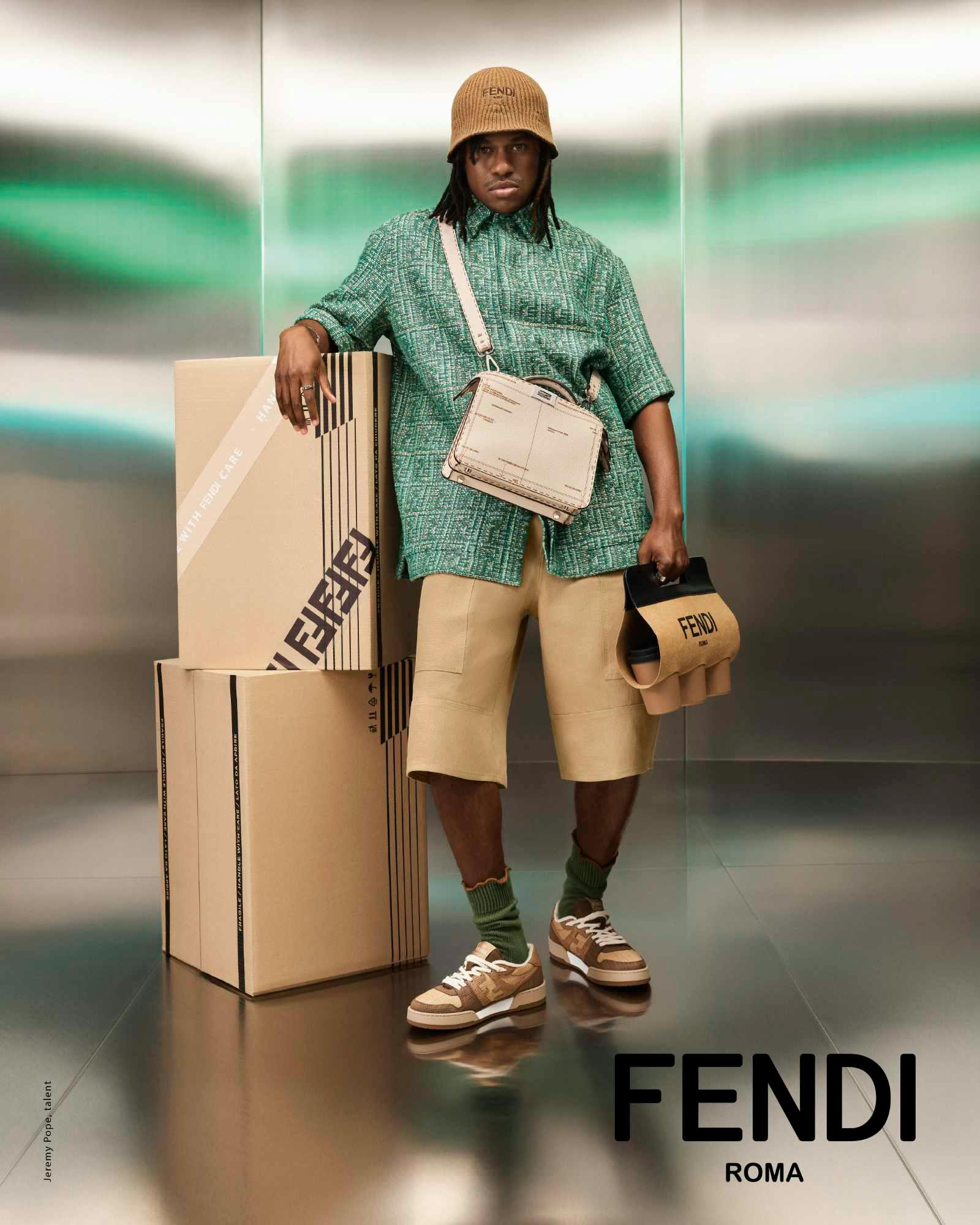 Models wear Fendi's SS24 menswear collection