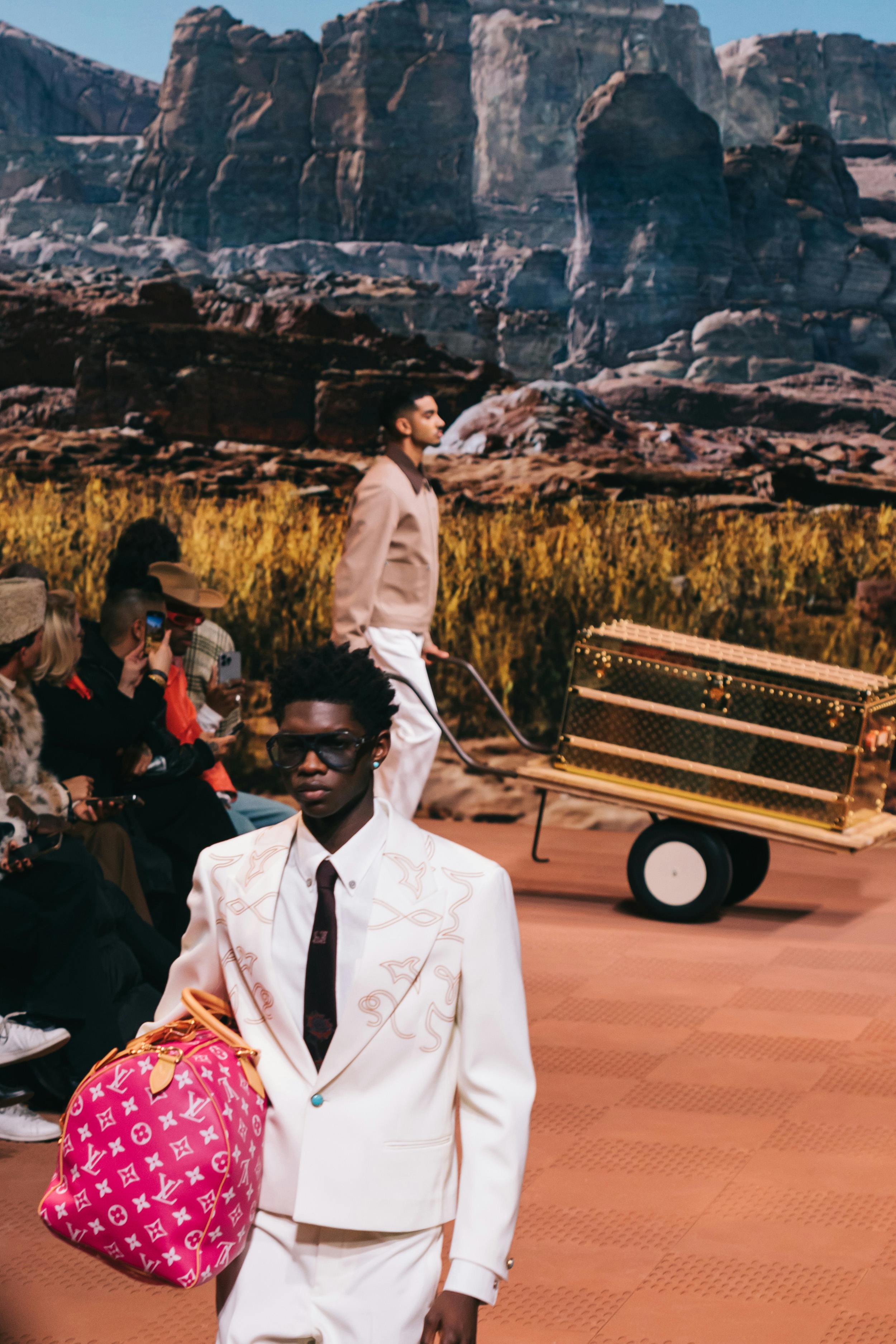 Models wear Pharrell's Louis Vuitton FW24 menswear collection