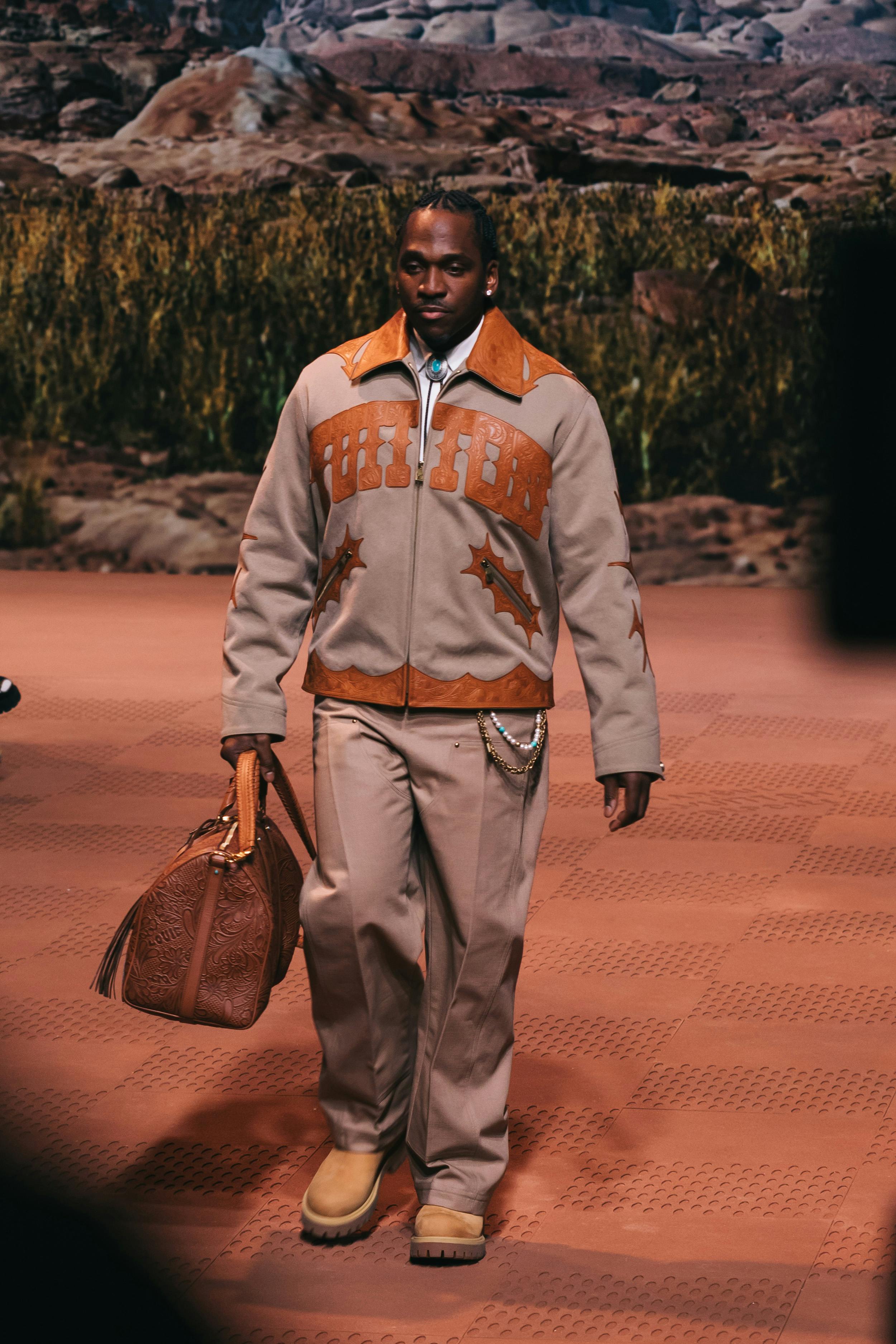 Models wear Pharrell's Louis Vuitton FW24 menswear collection