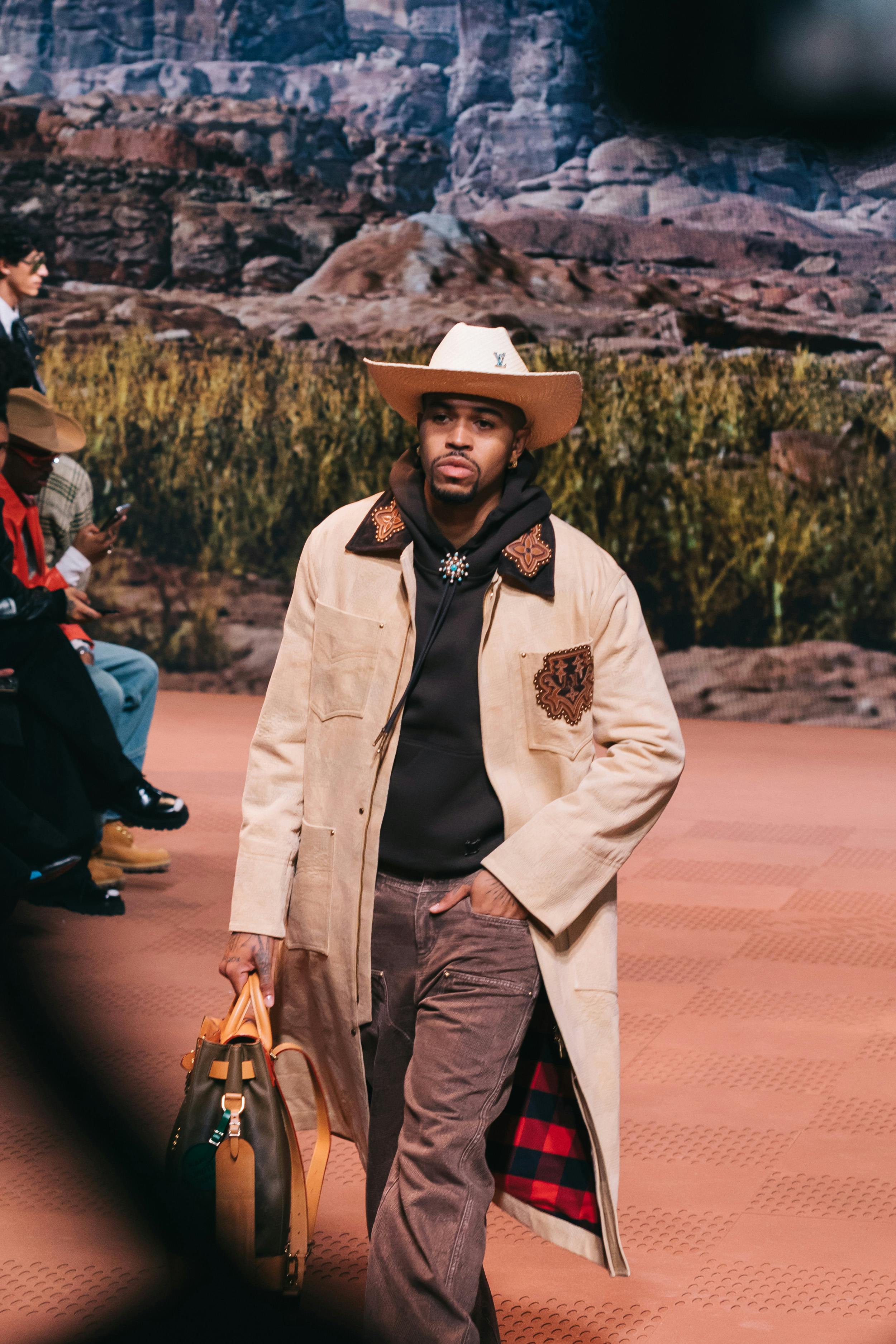 Models wear Pharrell's Louis Vuitton FW24 menswear collection