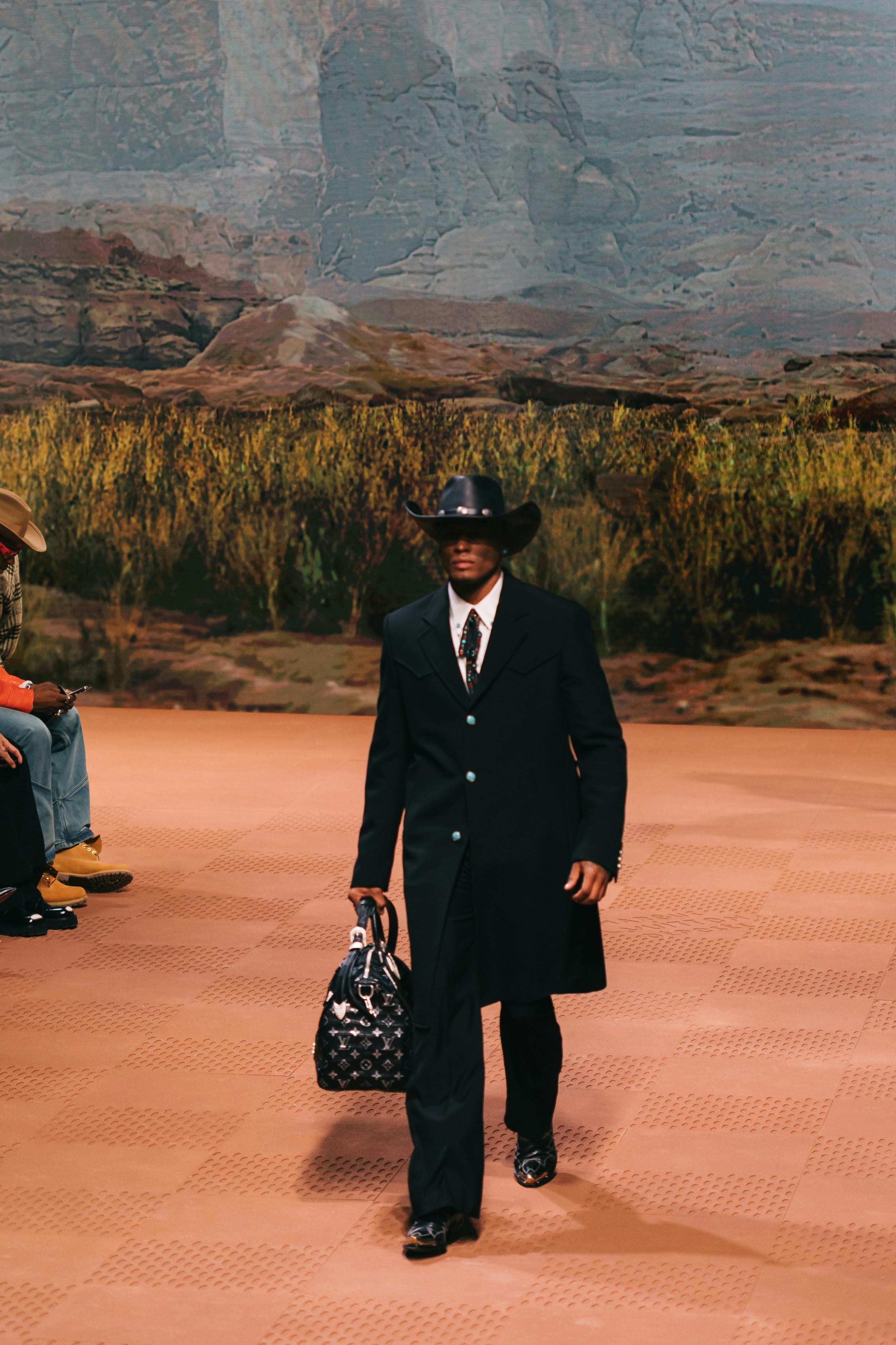 Models wear Pharrell's Louis Vuitton FW24 menswear collection