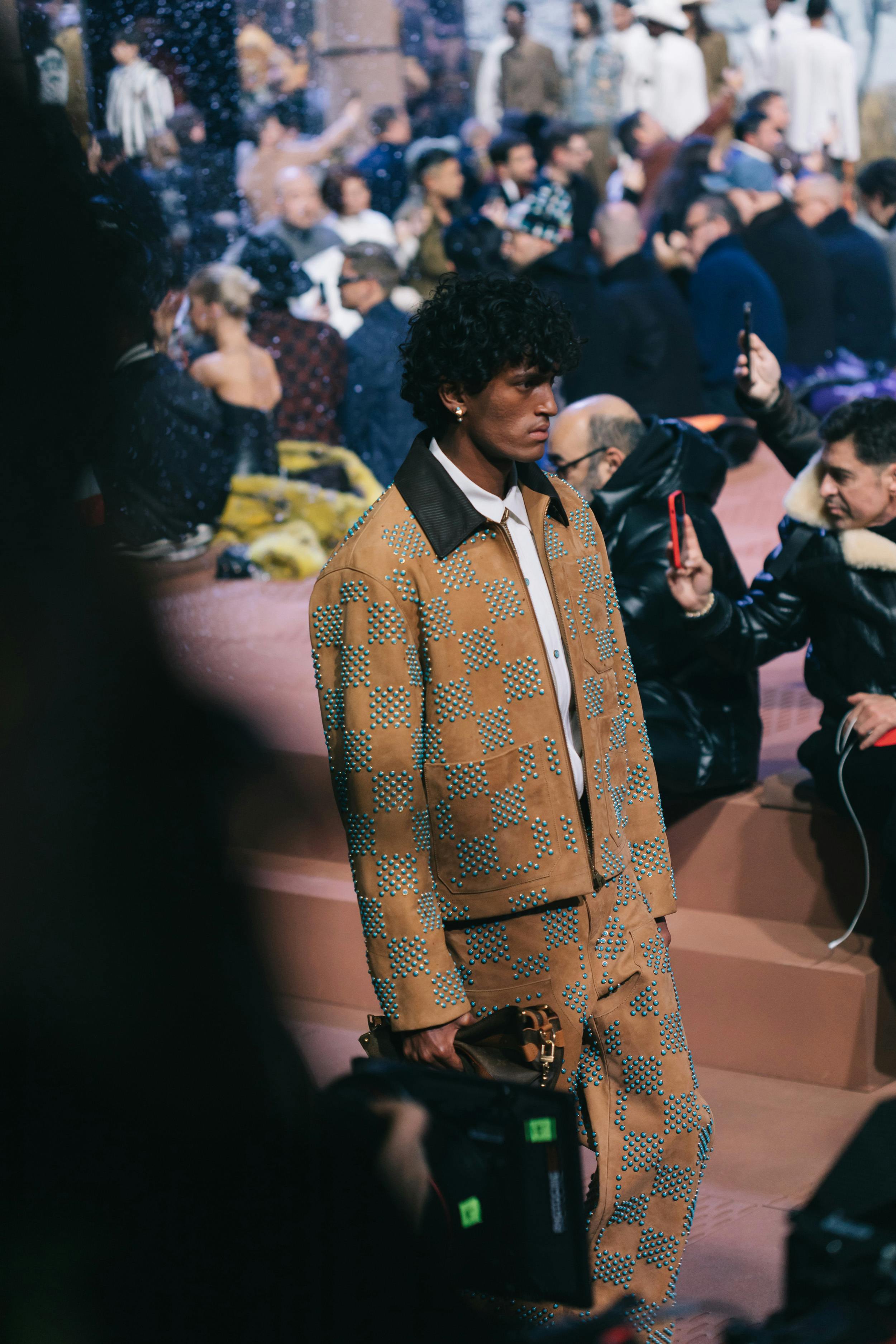 Models wear Pharrell's Louis Vuitton FW24 menswear collection