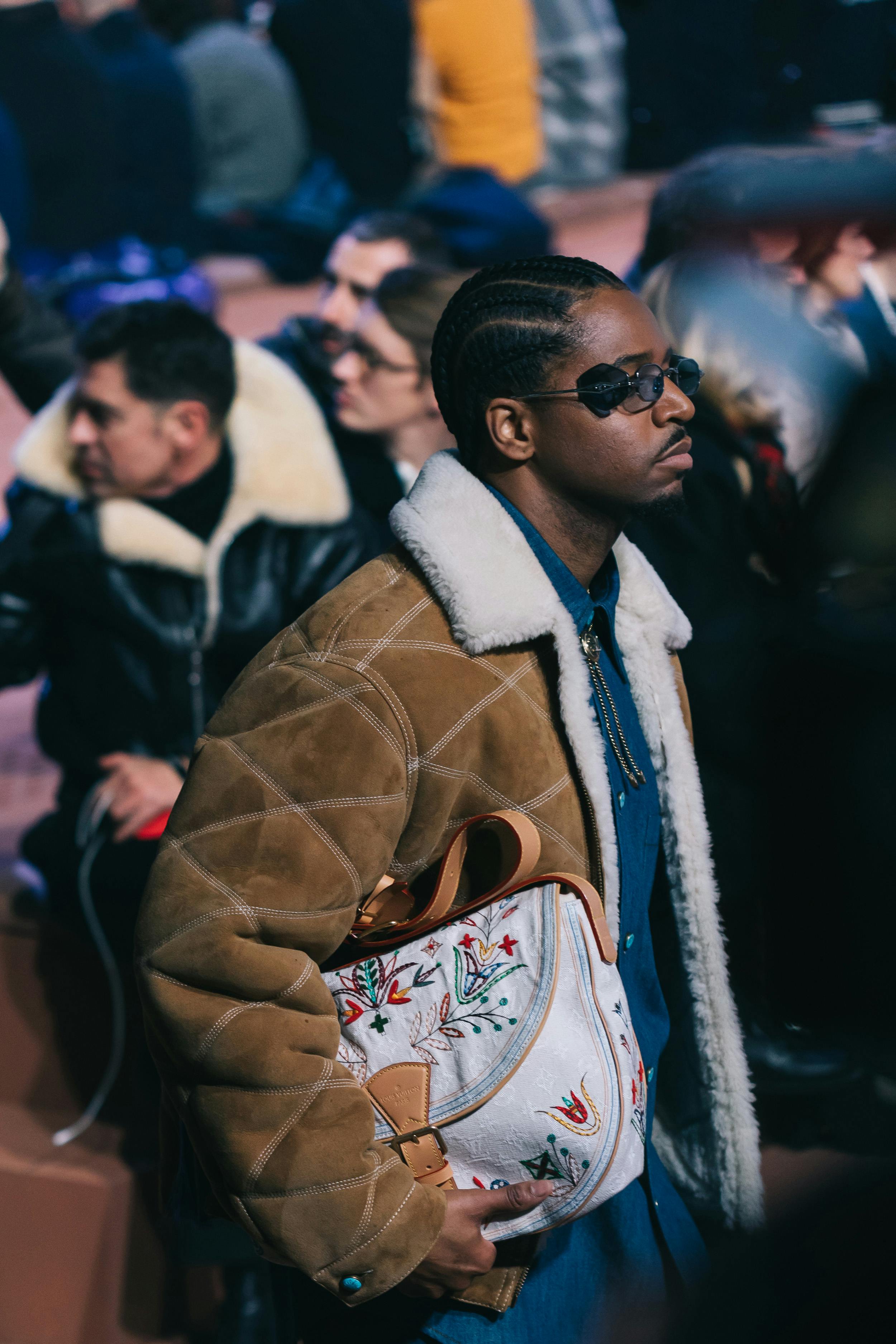 Models wear Pharrell's Louis Vuitton FW24 menswear collection