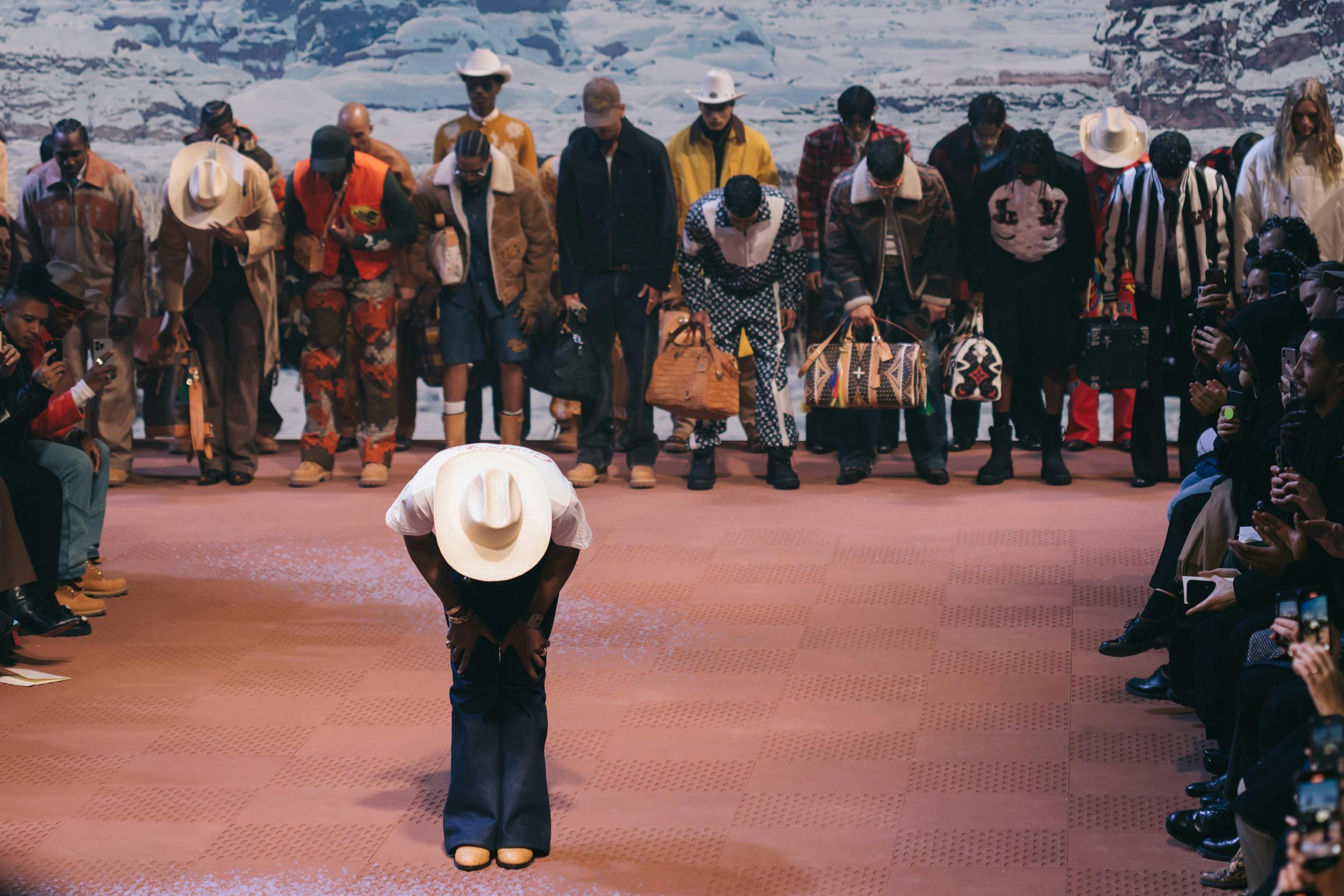 Models wear Pharrell's Louis Vuitton FW24 menswear collection