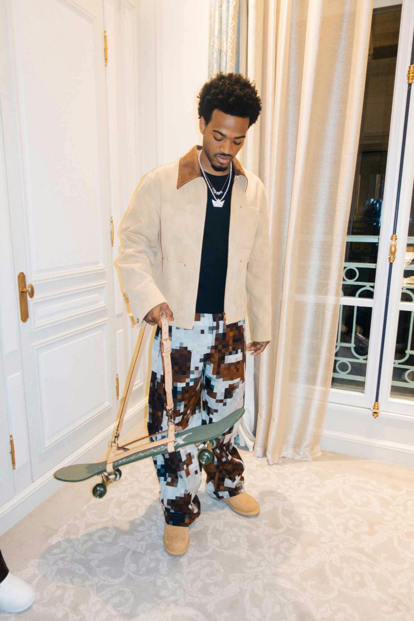 Tyshawn Jones attends Pharrell's Louis Vuitton FW24 runway show