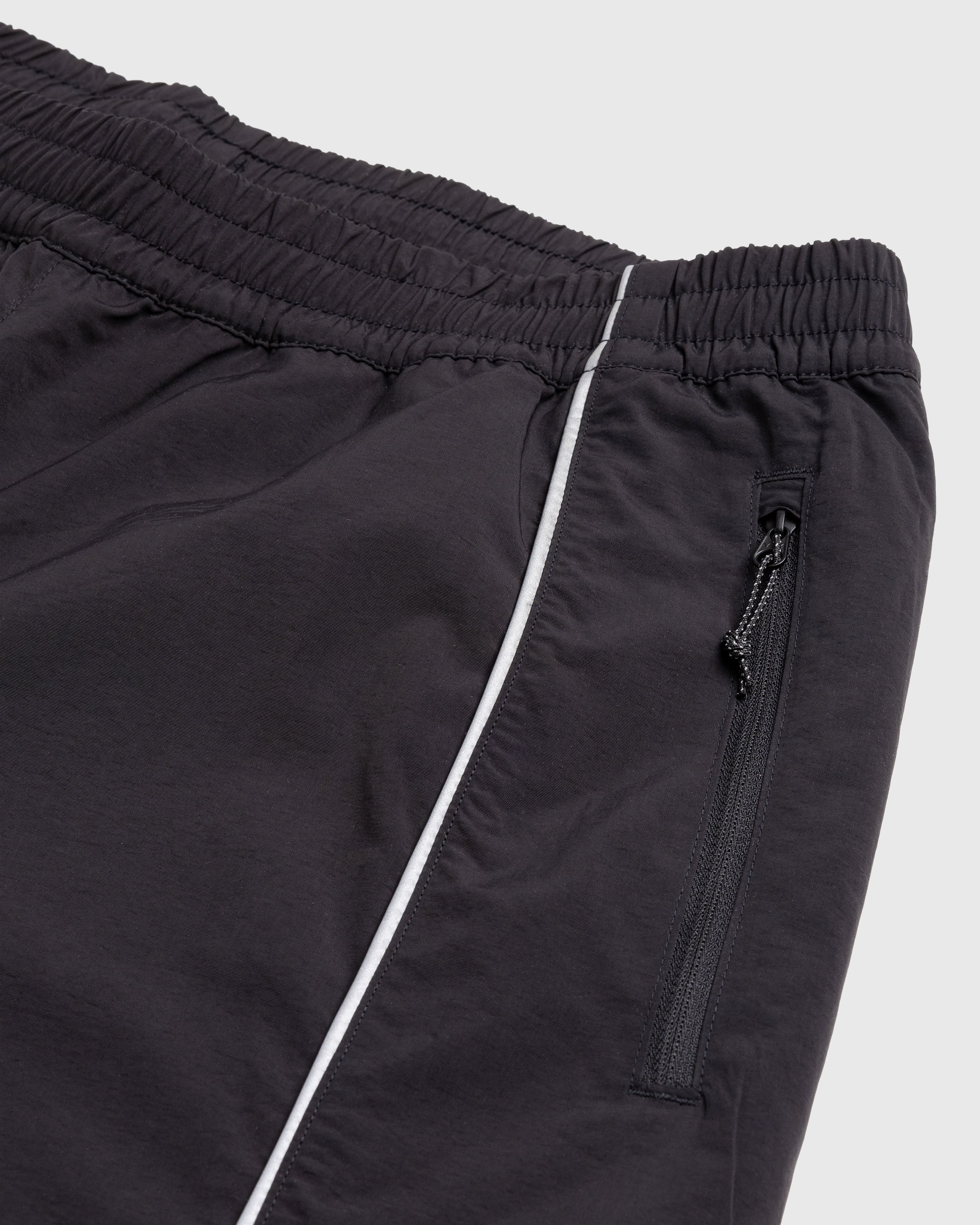 The North Face – Tek Piping Wind Pants TNF Black | Highsnobiety Shop