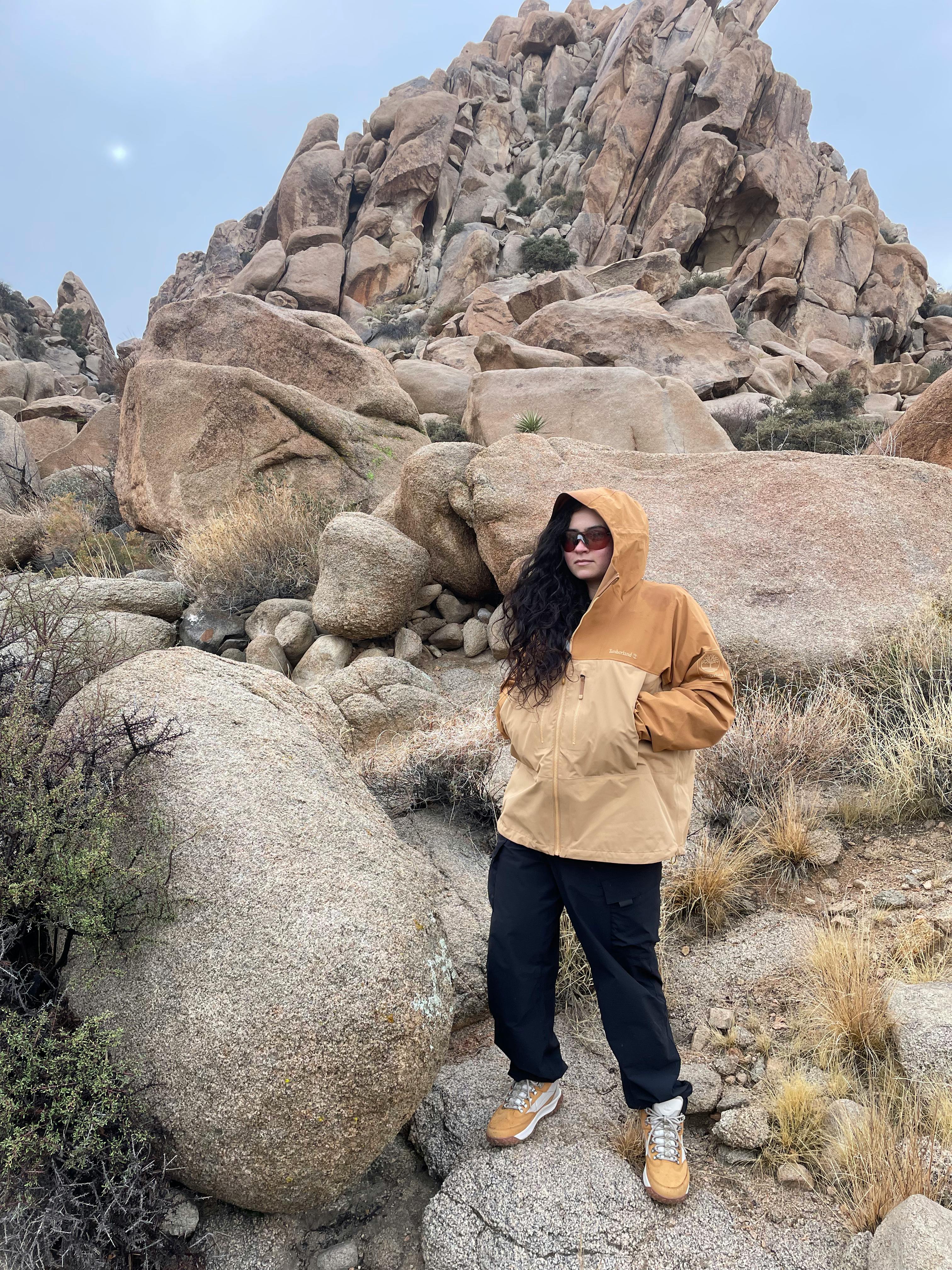 Talia Restrepo hiking in Joshua Tree wearing Timberlands