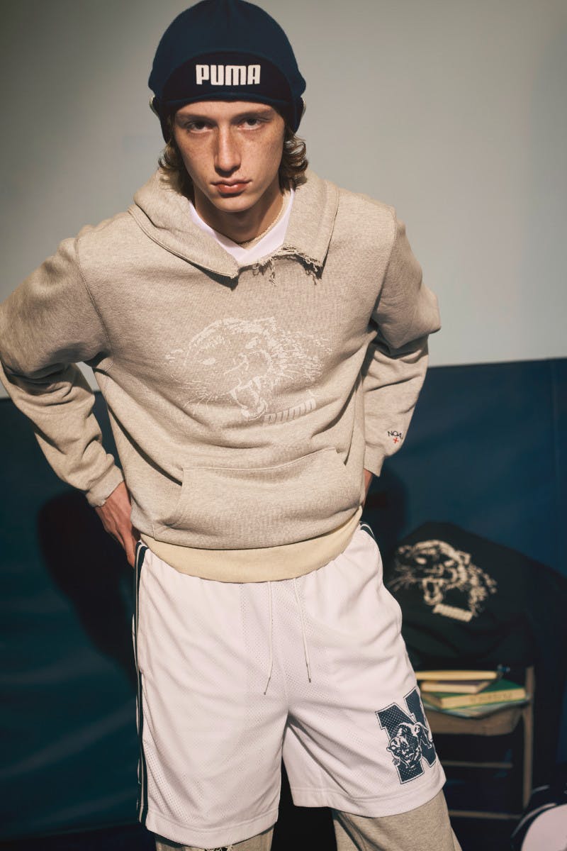 PUMA x Noah's new sportswear collection worn on models in locker room.