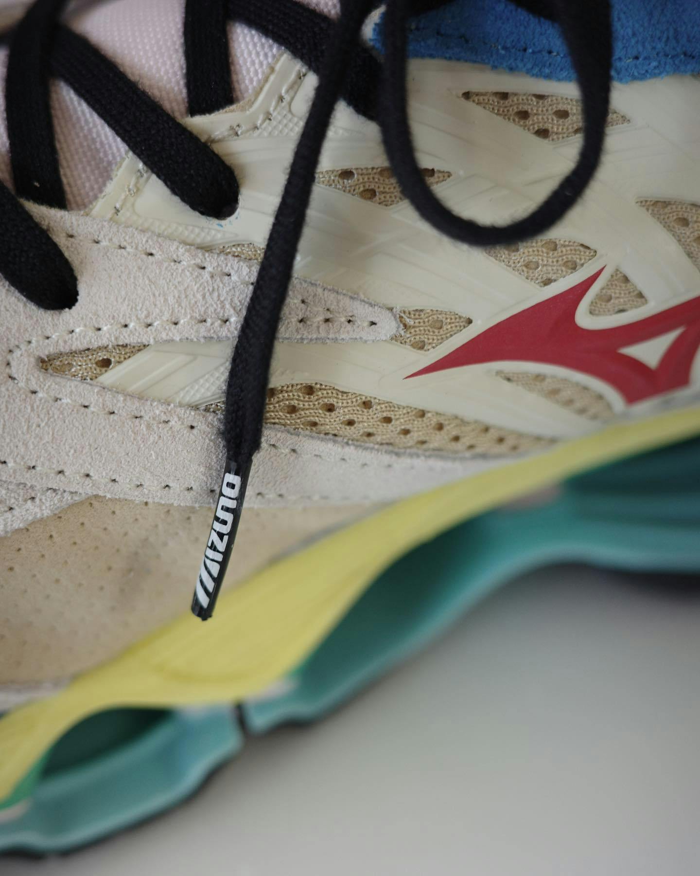 Mizuno & Hiroshi Nagai's collaborative Wave Prophecy LS sneaker in beige, blue, and yellow