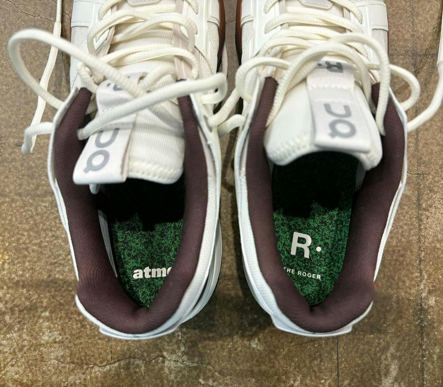 Roger Federer's On ROGER tennis sneaker in white and black with grass insole designed by atmos Japan