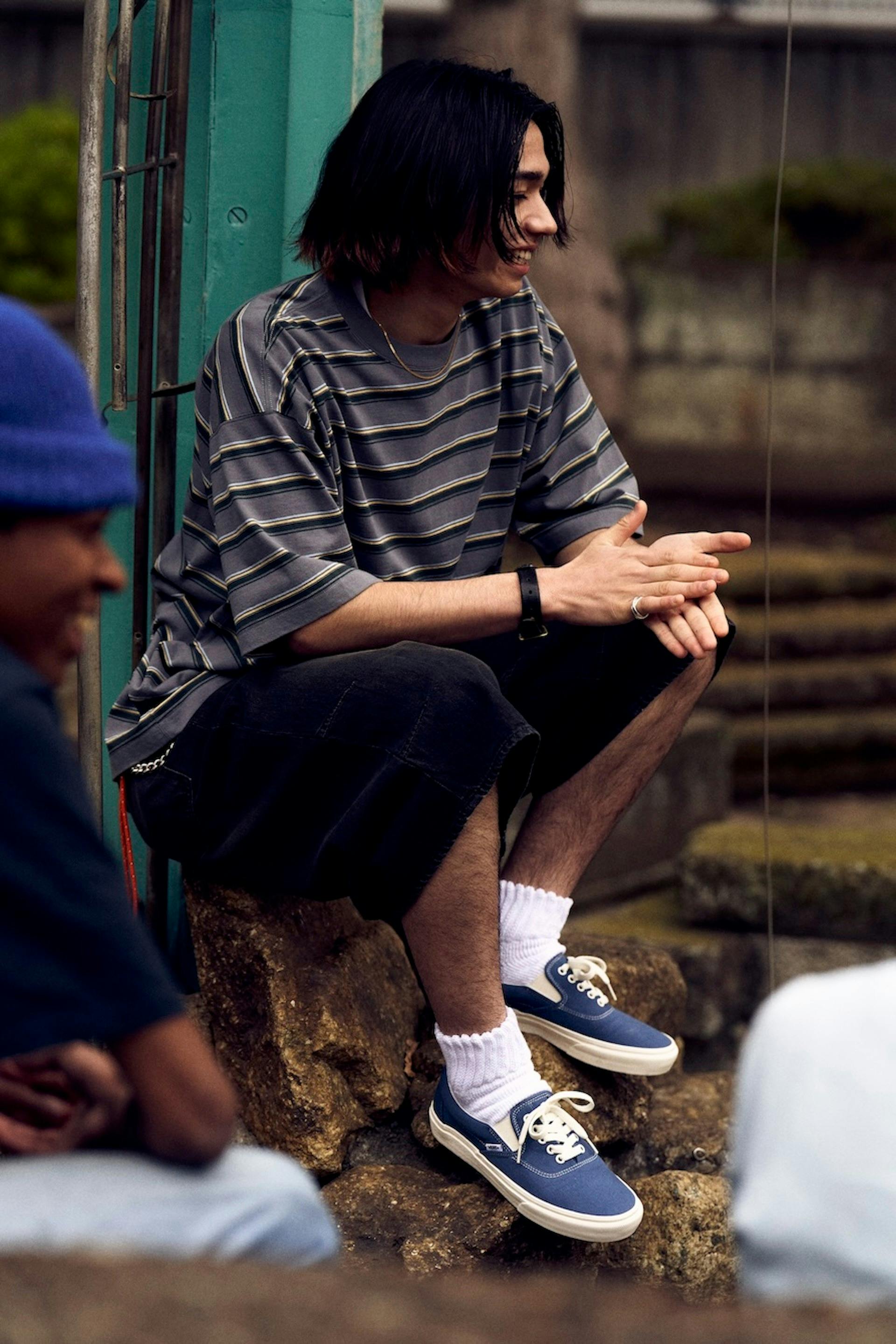 Vans' Erap sneaker that combines the Era and Slip-On sneakers in blue, black, and yellow checkerboard