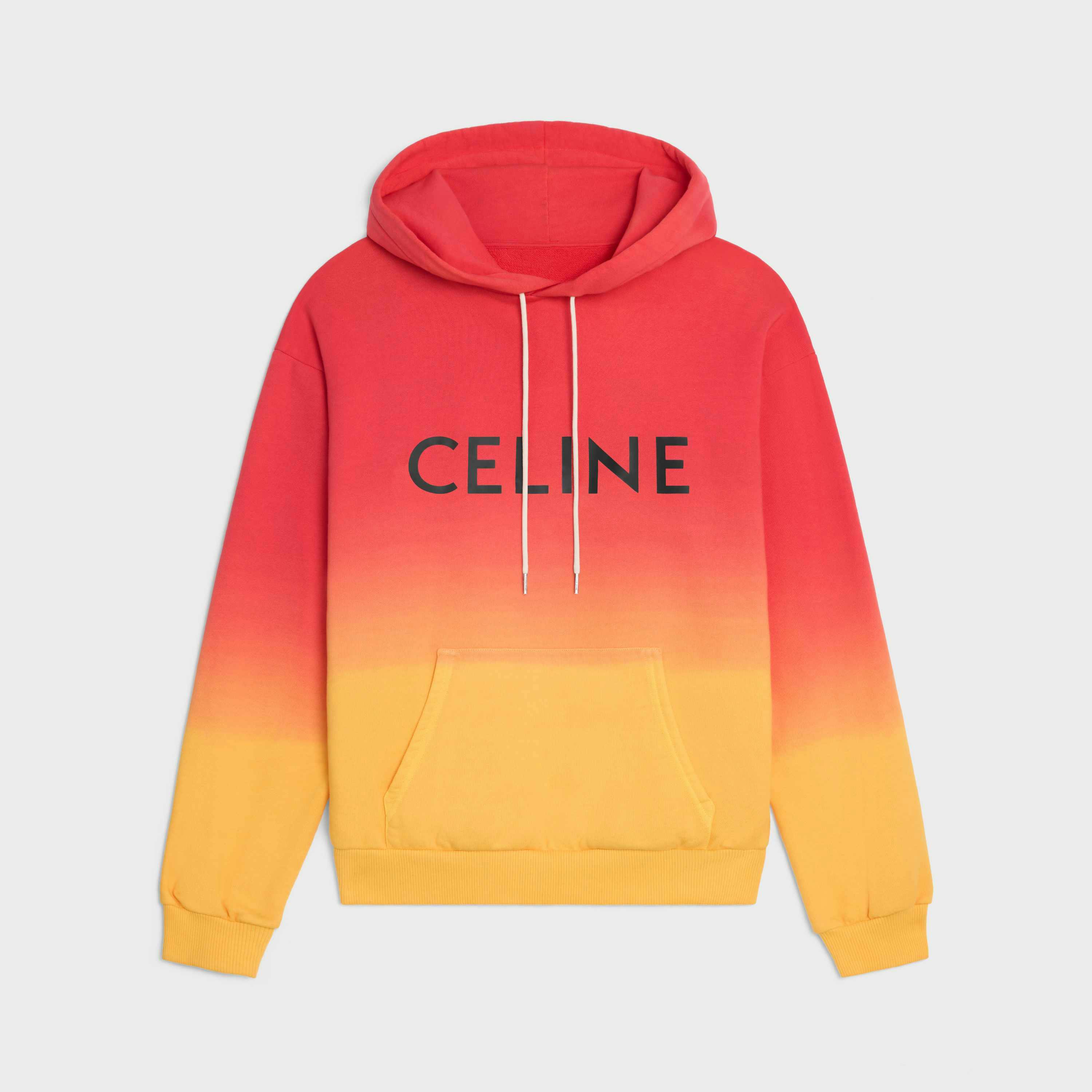 CELINE's Surf menswear capsule, including shirts, glasses, shoes, sneakers, bags, and surfboard