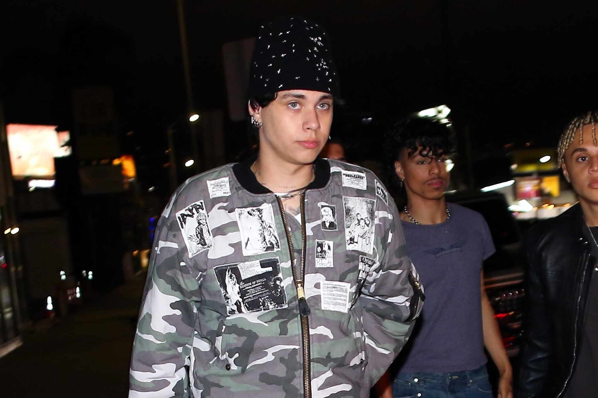 Landon Barker wears Raf Simons' Riot Riot Riot bomber in green camouflage worth $40,000