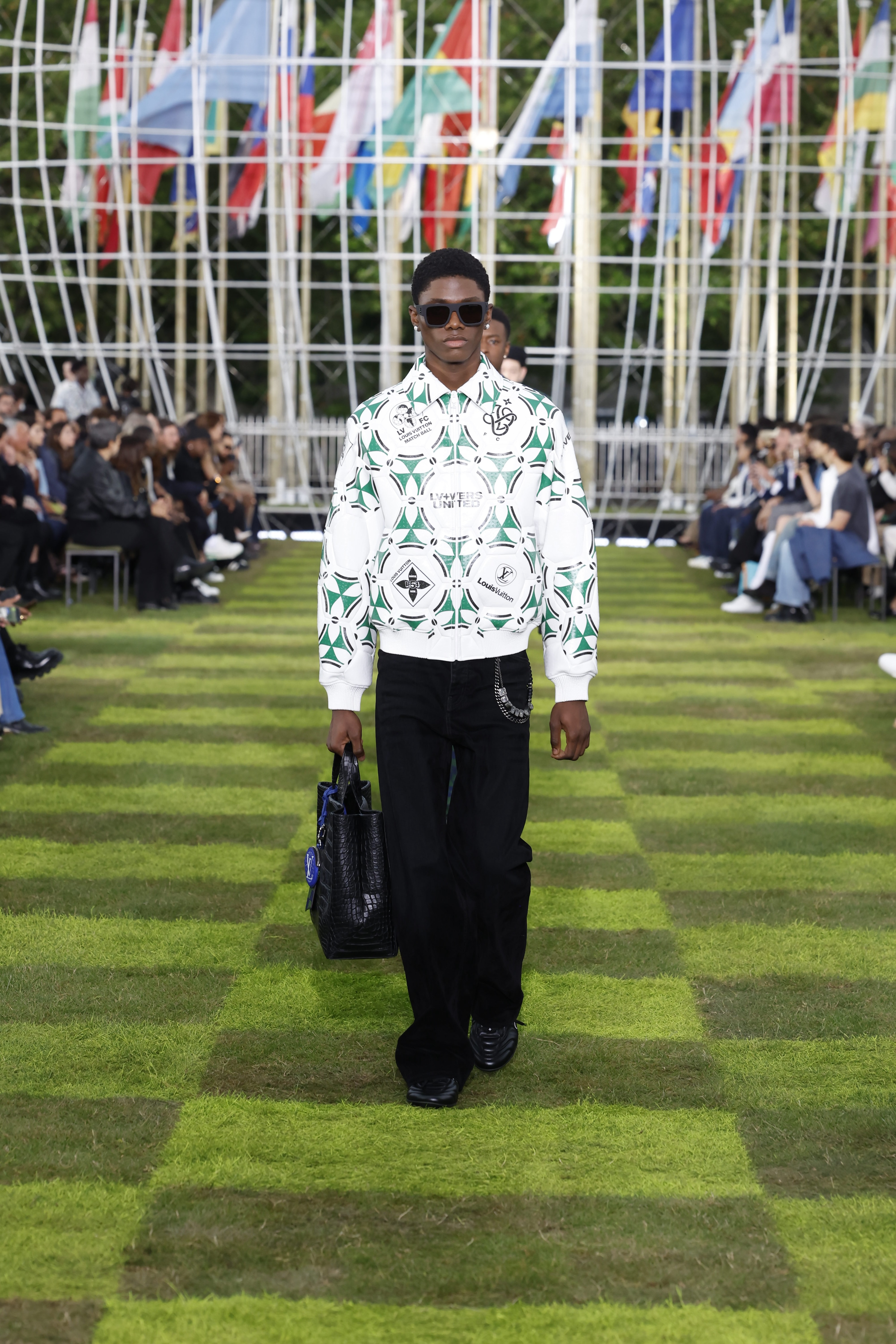 Images of Louis Vuitton Spring/Summer 2025 runway show in Paris.