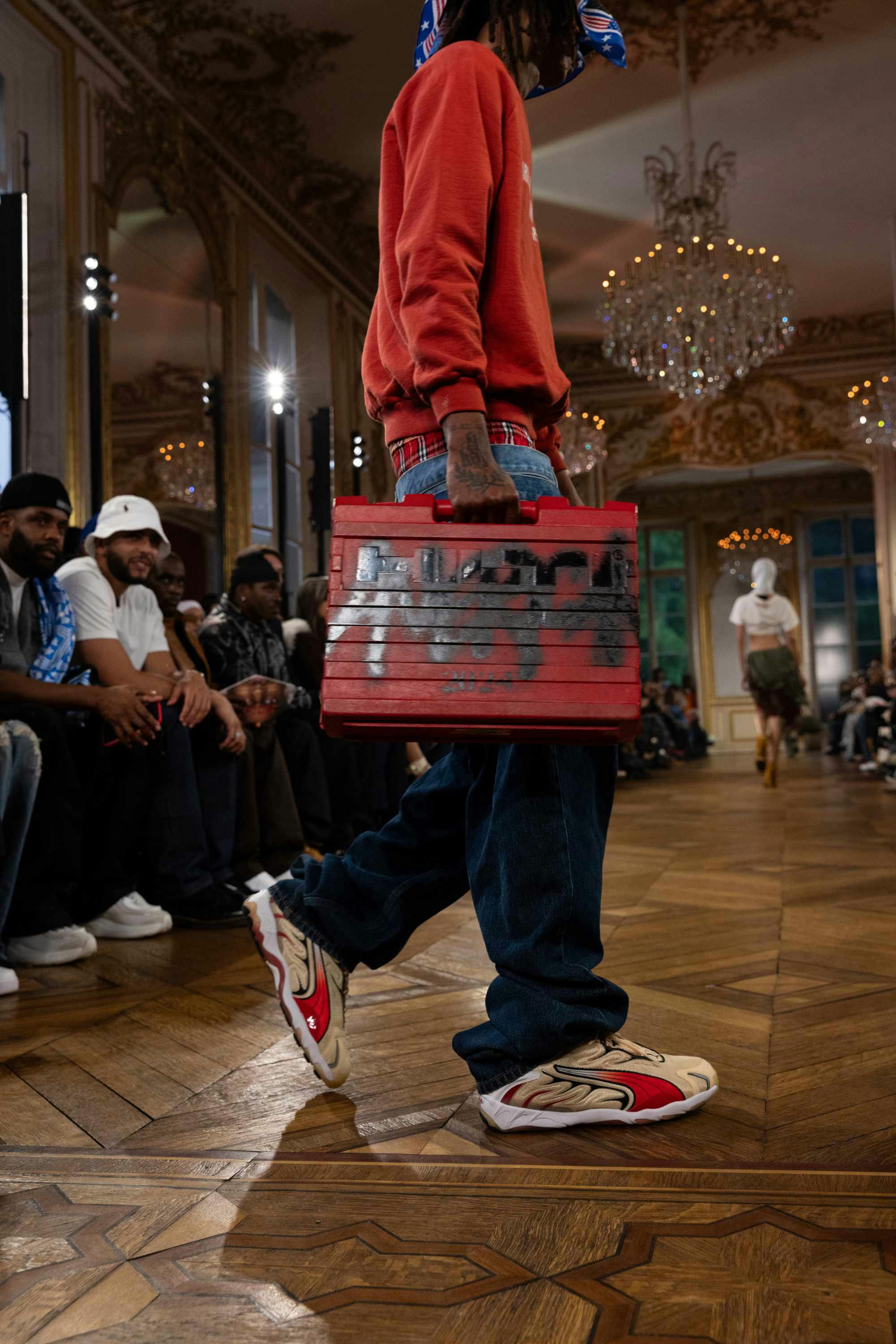 Models at A$AP Rocky's AWGE fashion show wear PUMA sneakers and clothes