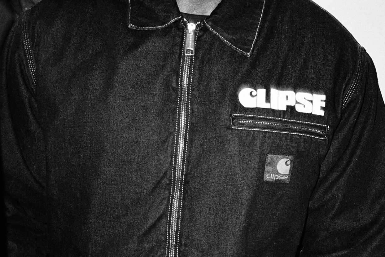 Carhartt & Clipse's collaborative work jacket in dark indigo with co-branded Carhartt logos and patches