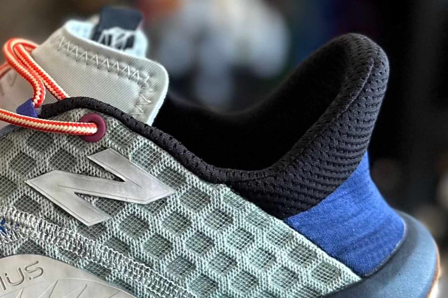 Action Bronson's New Balance Minimus Trail 2024 sneaker collab in grey, purple, and green colorway