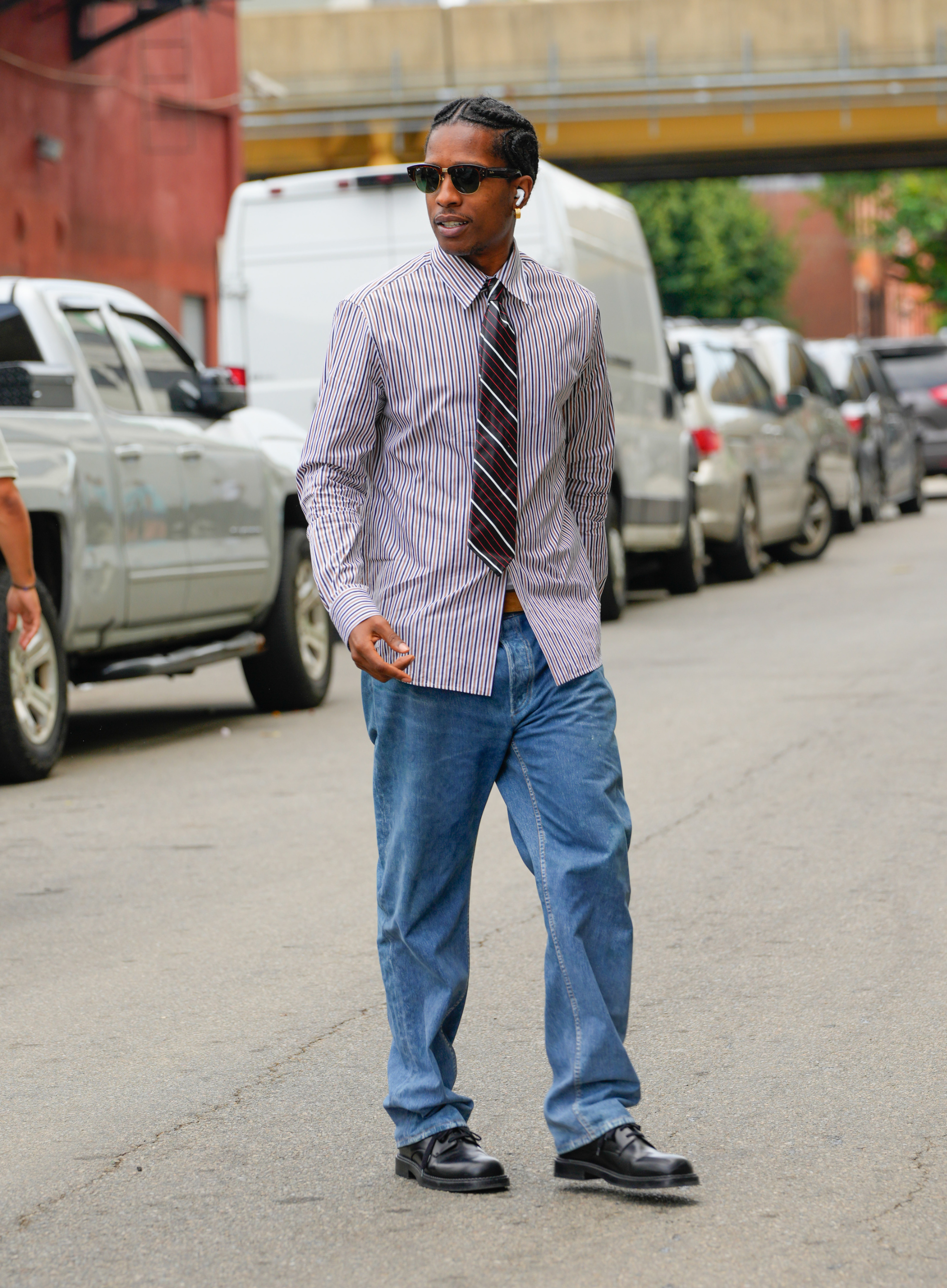 A$AP Rocky wearing a tie and jeans in NYC