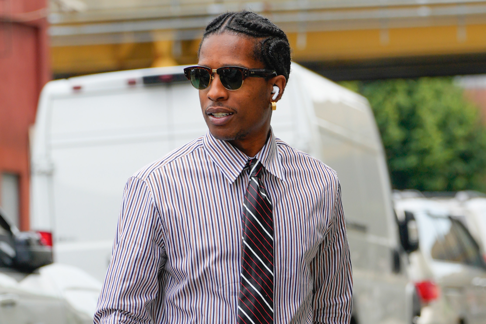 A$AP Rocky wearing a tie and jeans in NYC