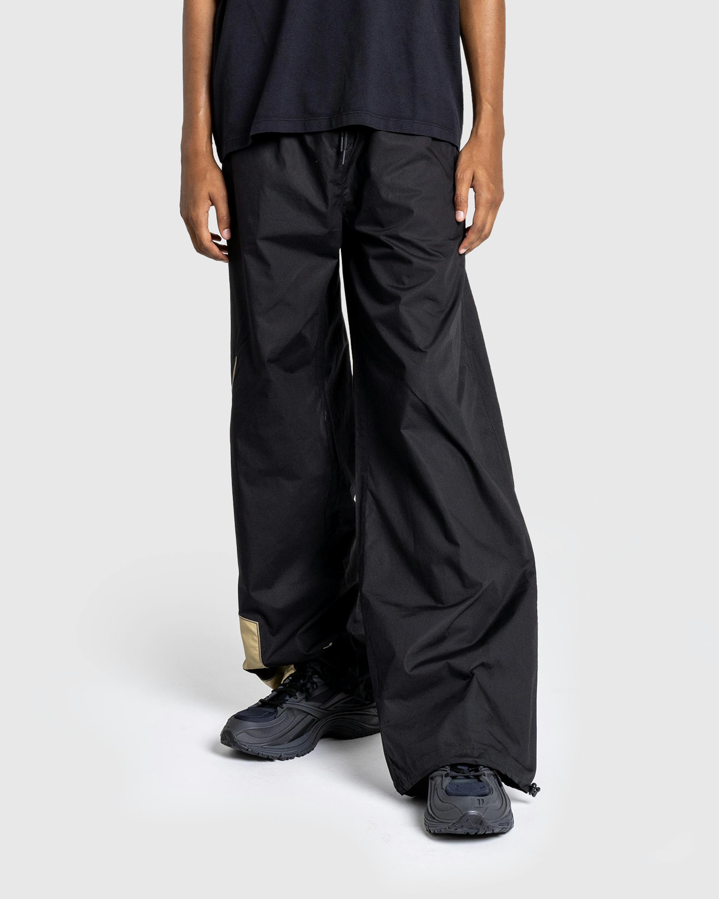 Reebok – Unisex Icon Remix Track Pant Black/Mocha - Active Pants - Black - Image 2