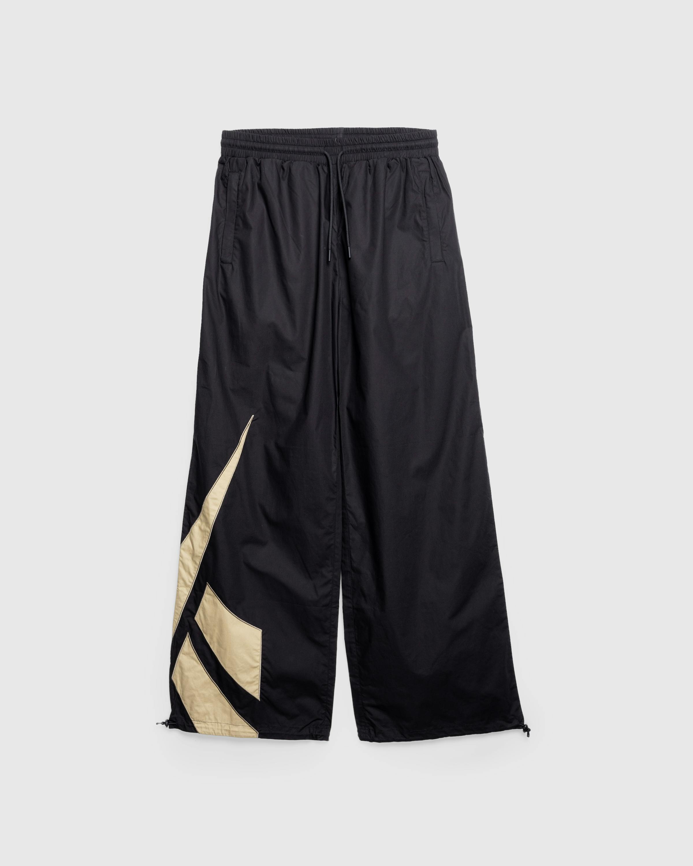 Reebok – Unisex Icon Remix Track Pant Black/Mocha - Active Pants - Black - Image 1