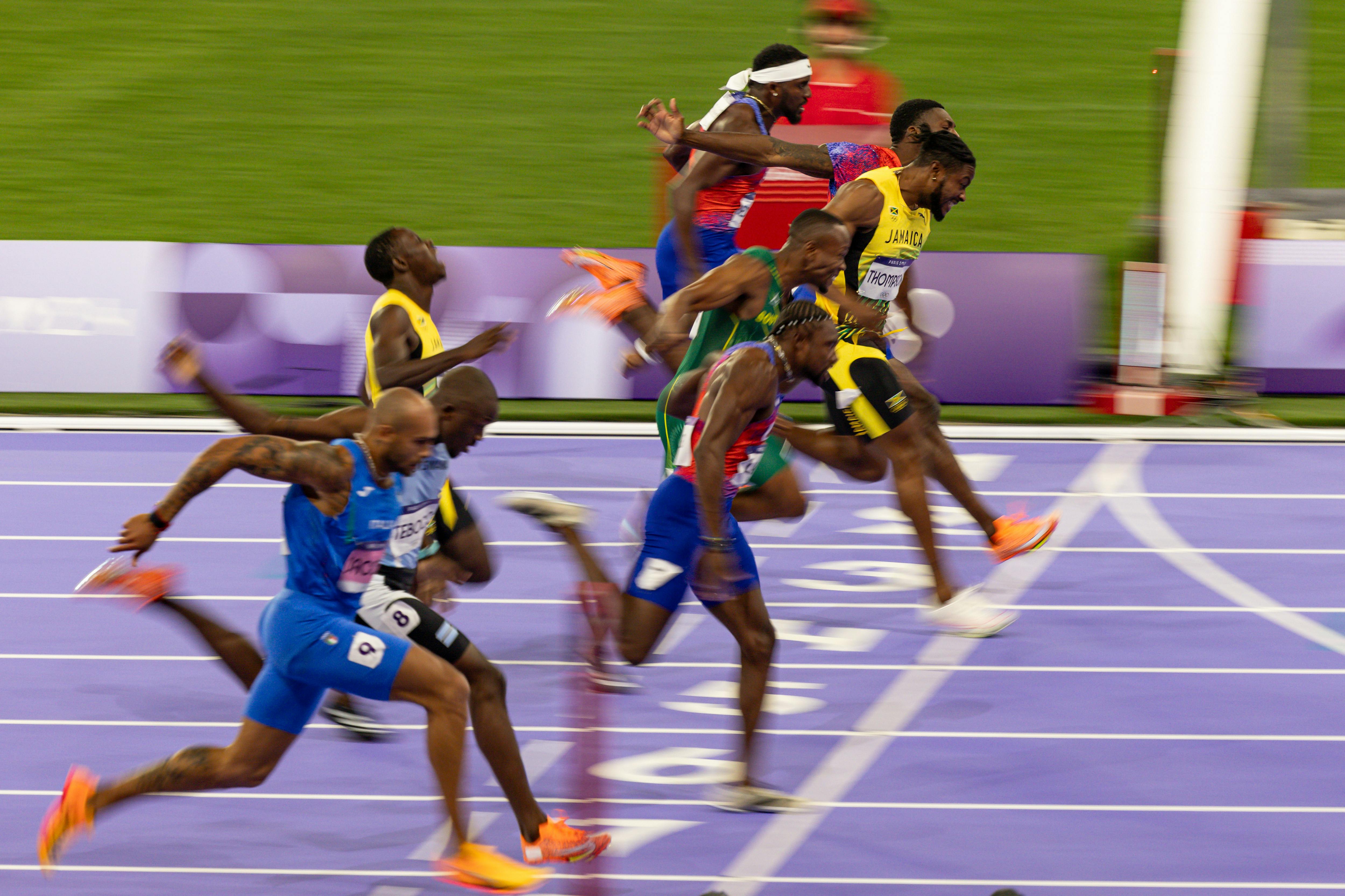 Noah Lyles of Team United States crosses the finish line during the Men's 100m Final on day nine of the Olympic Games Paris 2024 at Stade de France